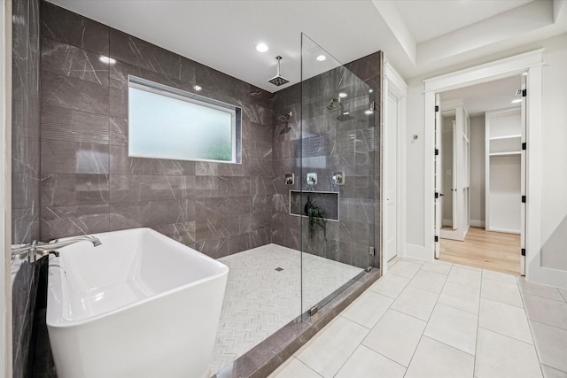 608 E 25th St, Houston, TX 77008 - full bath featuring a freestanding bath, a stall shower, tile patterned flooring, and recessed lighting