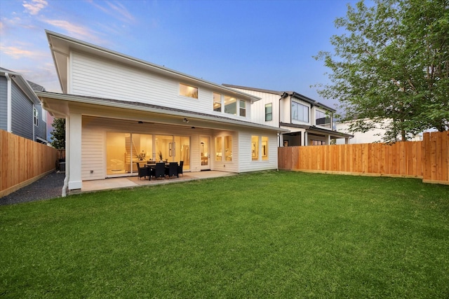 608 E 25th St, Houston, TX 77008 - back of property featuring a fenced backyard and a patio area