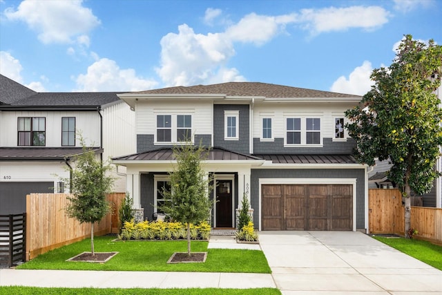 608 E 25th St, Houston, TX 77008 - view of front of home with a standing seam roof, driveway, an attached garage, a metal roof, and a shingled roof
