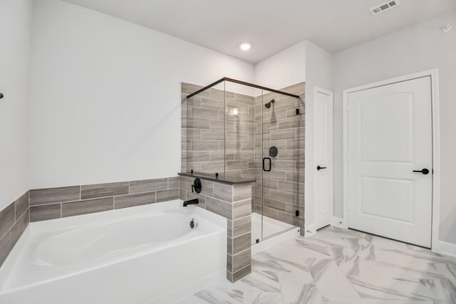 6804 Westview Dr Unit 3405, Houston, TX 77055 - full bath featuring a bath, a stall shower, marble finish floors, and recessed lighting