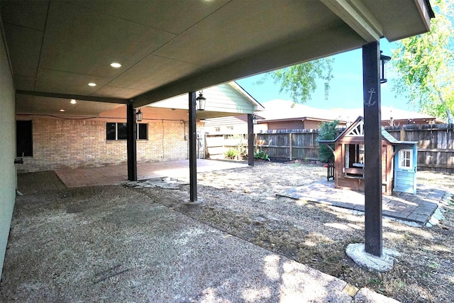9611 Huntington Hill Dr, Houston, TX 77099 - fenced backyard with a patio area