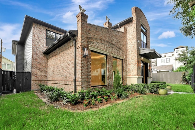 4316 Dickson St, Houston, TX 77007 - back of house featuring brick siding