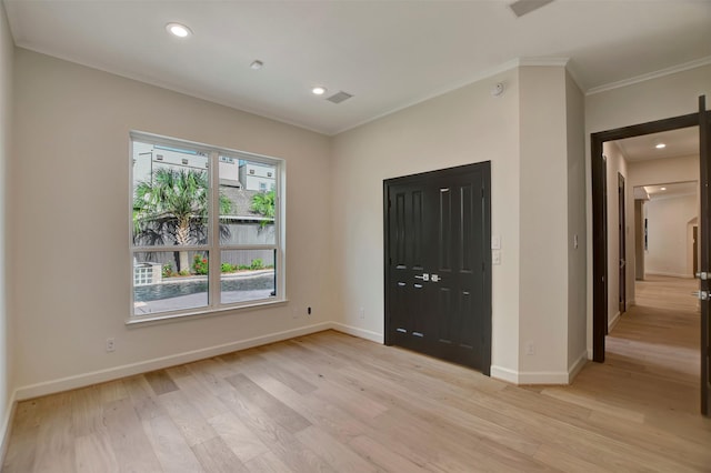 4316 Dickson St, Houston, TX 77007 - unfurnished bedroom with light wood-style floors, ornamental molding, and recessed lighting