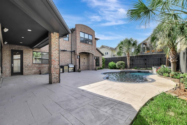4316 Dickson St, Houston, TX 77007 - view of pool with a patio, area for grilling, and a fenced backyard
