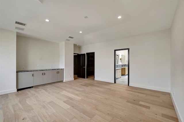 4316 Dickson St, Houston, TX 77007 - unfurnished room with light wood-type flooring and recessed lighting