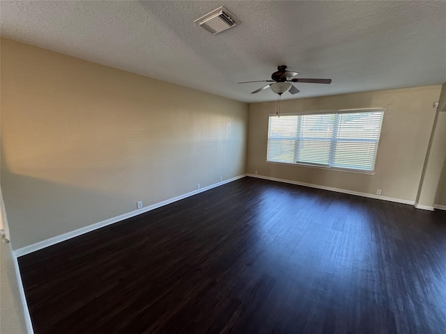 18322 Valiant Brook Ct, Humble, TX 77346 - empty room with dark wood-style floors, a ceiling fan, and a textured ceiling