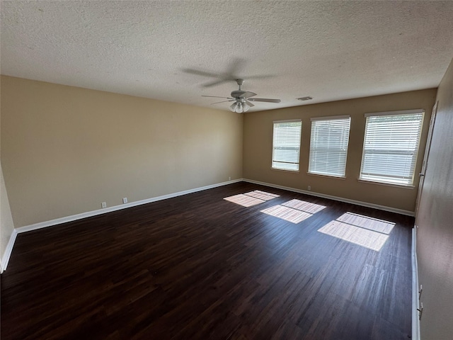 18322 Valiant Brook Ct, Humble, TX 77346 - empty room with dark wood-style flooring, a ceiling fan, and a textured ceiling