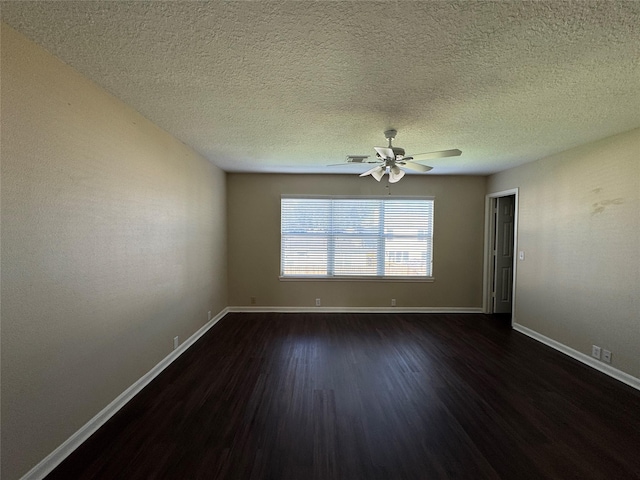 18322 Valiant Brook Ct, Humble, TX 77346 - unfurnished room with dark wood finished floors, a ceiling fan, and a textured ceiling