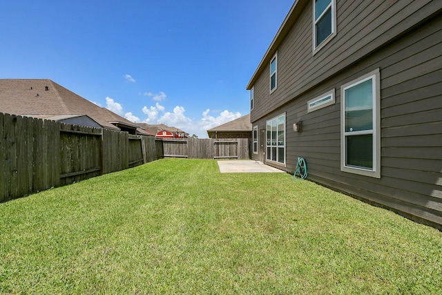 4134 Loft Square Pl, Humble, TX 77346 - fenced backyard with a patio area