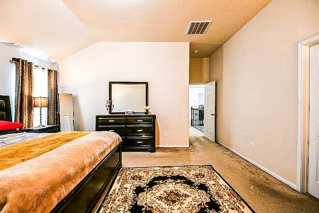 4134 Loft Square Pl, Humble, TX 77346 - bedroom with lofted ceiling and light colored carpet