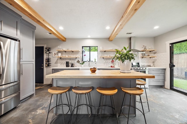 402 E 25th St, Houston, TX 77008 - kitchen with stainless steel fridge, range hood, open shelves, beam ceiling, and recessed lighting