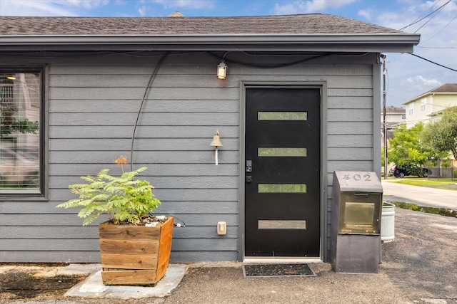 402 E 25th St, Houston, TX 77008 - entrance to property with a shingled roof
