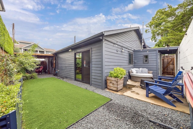 402 E 25th St, Houston, TX 77008 - back of property featuring a patio and outdoor lounge area