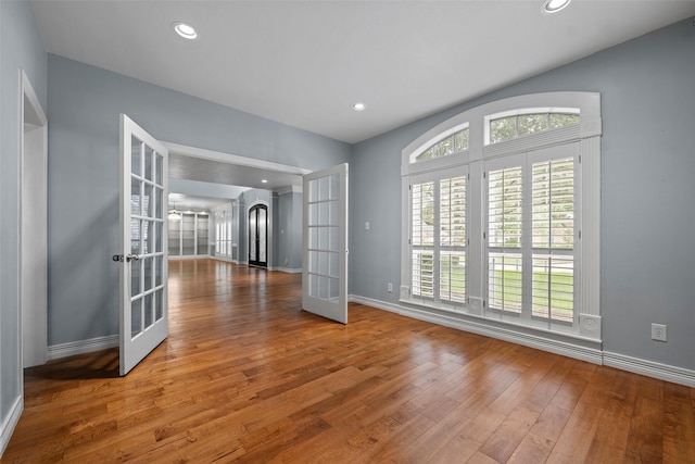 12814 Josey Creek Ct, Cypress, TX 77433 - empty room featuring french doors, wood-type flooring, and recessed lighting