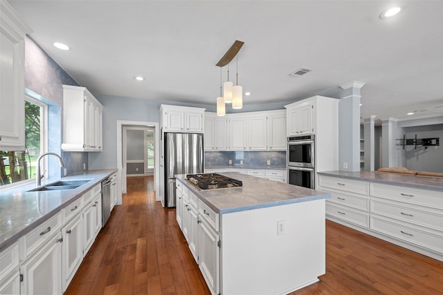12814 Josey Creek Ct, Cypress, TX 77433 - kitchen with stainless steel appliances, plenty of natural light, white cabinetry, a kitchen island, and recessed lighting