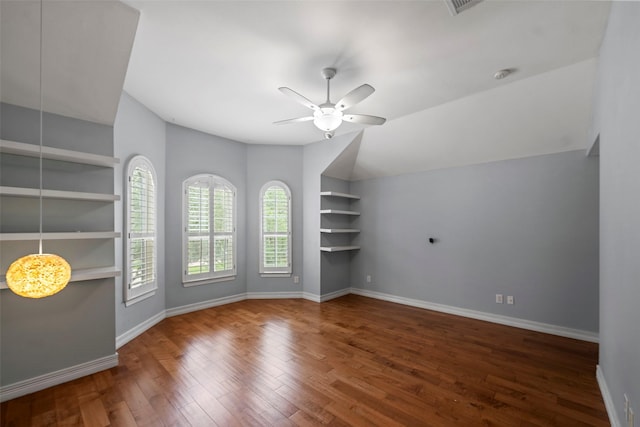 12814 Josey Creek Ct, Cypress, TX 77433 - spare room with a ceiling fan, wood finished floors, built in features, a smoke detector, and vaulted ceiling