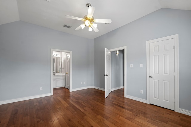 12814 Josey Creek Ct, Cypress, TX 77433 - unfurnished bedroom featuring vaulted ceiling, dark wood finished floors, connected bathroom, and a ceiling fan