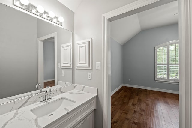 12814 Josey Creek Ct, Cypress, TX 77433 - bathroom with lofted ceiling, wood finished floors, and vanity