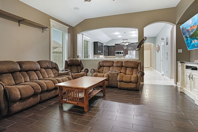 18819 Deer Trace Dr, Crosby, TX 77532 - living room with arched walkways, lofted ceiling, wood finish floors, and plenty of natural light