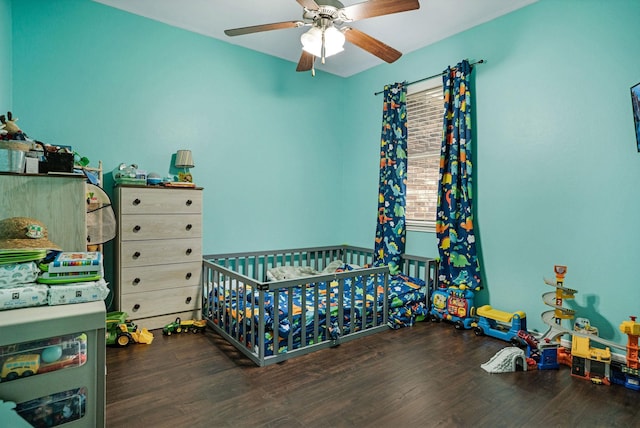 18819 Deer Trace Dr, Crosby, TX 77532 - bedroom with wood finished floors, a crib, and a ceiling fan