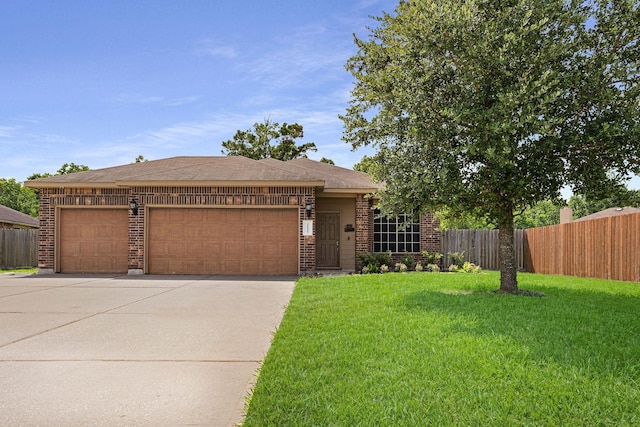 18819 Deer Trace Dr, Crosby, TX 77532 - view of front of home featuring brick siding, a garage, and driveway