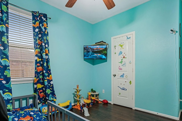 18819 Deer Trace Dr, Crosby, TX 77532 - recreation room with dark wood-style floors and ceiling fan