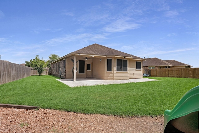 18819 Deer Trace Dr, Crosby, TX 77532 - back of house with ceiling fan, a patio, and a fenced backyard