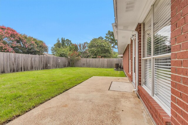 2307 Pine Cone Dr, Houston, TX 77339 - fenced backyard featuring a patio