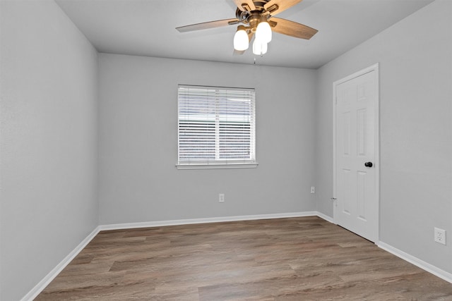 2307 Pine Cone Dr, Houston, TX 77339 - spare room with a ceiling fan and wood finished floors