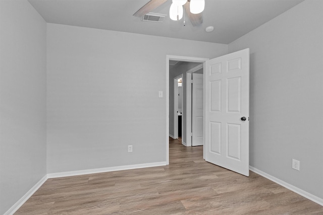 2307 Pine Cone Dr, Houston, TX 77339 - spare room featuring a ceiling fan and light wood-type flooring