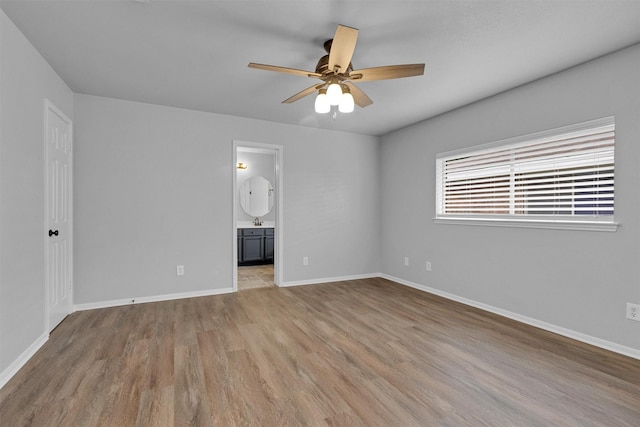 2307 Pine Cone Dr, Houston, TX 77339 - spare room with wood finished floors and a ceiling fan