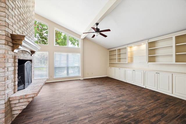 3002 Durban Dr, Houston, TX 77043 - unfurnished living room with a ceiling fan, vaulted ceiling, a brick fireplace, and dark wood finished floors