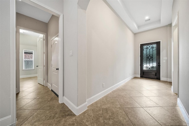 23414 Fauburg Dr, New Caney, TX 77357 - tiled entrance foyer featuring arched walkways