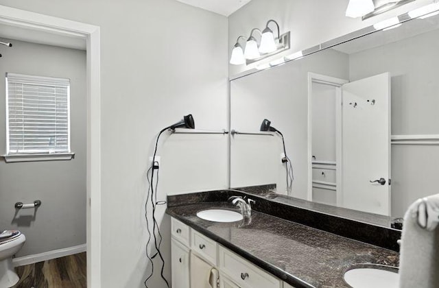 15110 Runbell Pl, Houston, TX 77095 - full bathroom with double vanity and wood finished floors