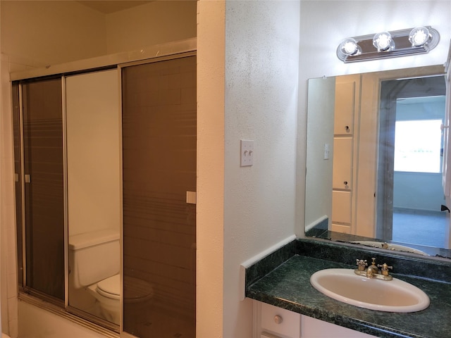 5801 Lumberdale Rd Unit 226, Houston, TX 77092 - bathroom with vanity and a textured wall