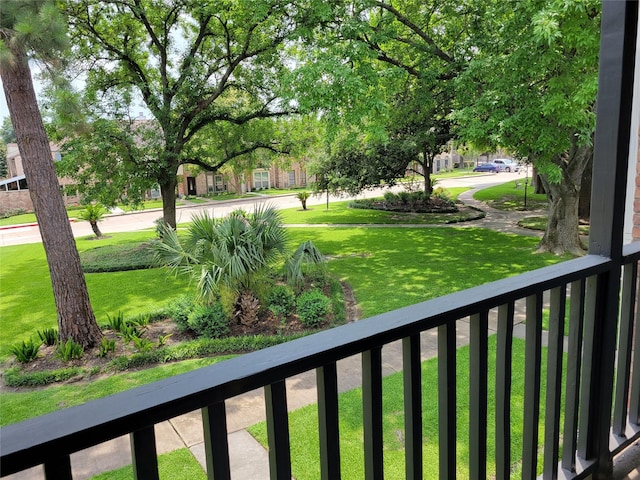 5801 Lumberdale Rd Unit 226, Houston, TX 77092 - view of green lawn with a balcony