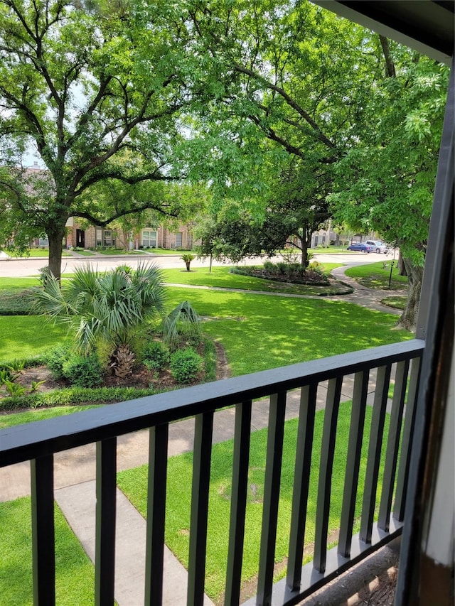 5801 Lumberdale Rd Unit 226, Houston, TX 77092 - view of yard featuring a balcony