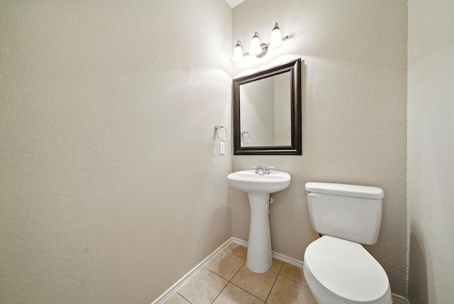 18123 Hillock Glen Ln, Cypress, TX 77429 - half bathroom featuring tile patterned floors and toilet