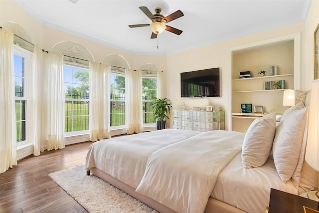 1734 Forestlake Dr, Sugar Land, TX 77479 - bedroom with crown molding, hardwood / wood-style floors, and ceiling fan