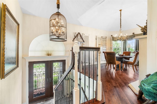 1734 Forestlake Dr, Sugar Land, TX 77479 - foyer entrance featuring a chandelier, wood finished floors, and french doors