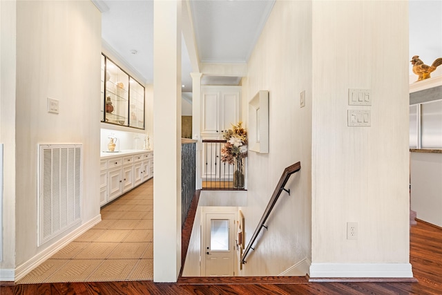 1734 Forestlake Dr, Sugar Land, TX 77479 - corridor featuring an upstairs landing, wood finished floors, and ornamental molding