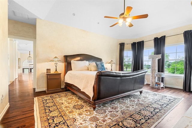 1734 Forestlake Dr, Sugar Land, TX 77479 - bedroom with dark wood-style flooring, multiple windows, and a ceiling fan