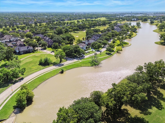 1734 Forestlake Dr, Sugar Land, TX 77479 - aerial view of residential area with a nearby body of water and a tree filled landscape