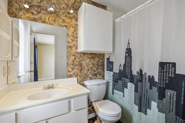 3600 Jeanetta St Unit 1902, Houston, TX 77063 - full bathroom with vanity, wallpapered walls, a textured ceiling, and a shower with shower curtain