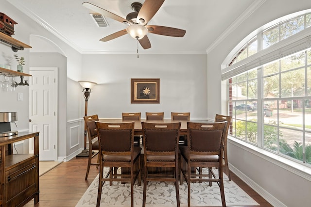 16403 Bogan Flats Ct, Houston, TX 77095 - dining area with wood finished floors, crown molding, and ceiling fan