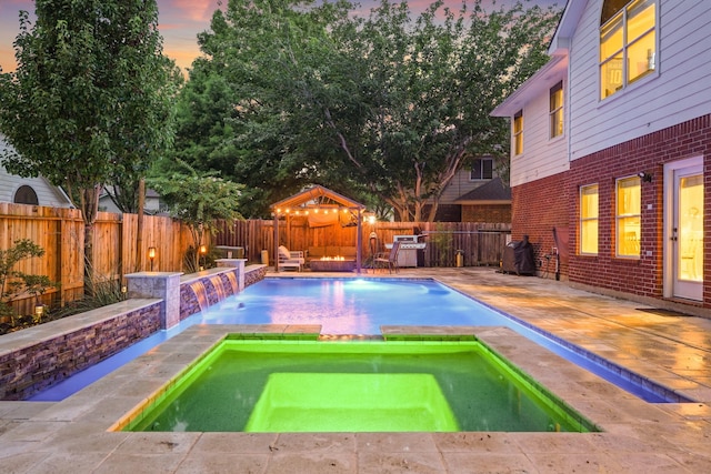 16403 Bogan Flats Ct, Houston, TX 77095 - view of swimming pool featuring a fenced backyard and an in-ground hot tub