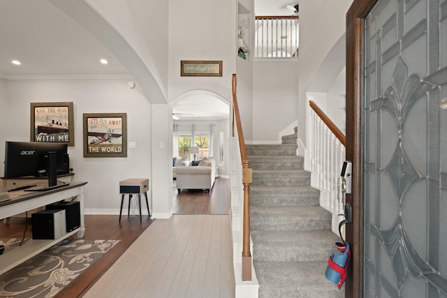 16403 Bogan Flats Ct, Houston, TX 77095 - foyer entrance with arched walkways, wood finished floors, a ceiling fan, stairway, and recessed lighting