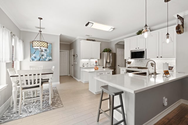 16403 Bogan Flats Ct, Houston, TX 77095 - kitchen featuring stainless steel refrigerator with ice dispenser, tasteful backsplash, light wood-style floors, a center island, and light countertops
