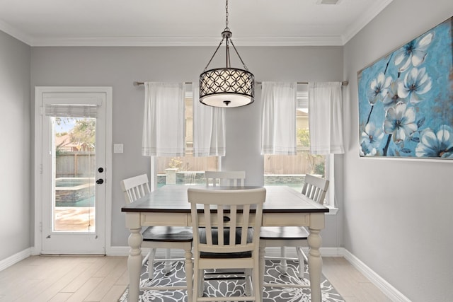 16403 Bogan Flats Ct, Houston, TX 77095 - dining space featuring wood finished floors and ornamental molding