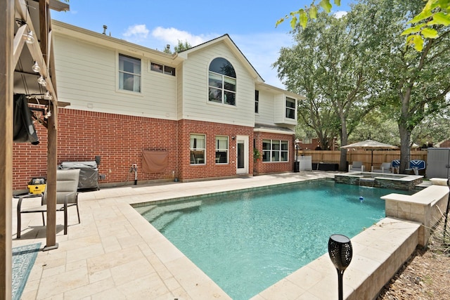 16403 Bogan Flats Ct, Houston, TX 77095 - view of pool with a patio, a fenced backyard, a pool with connected hot tub, and a grill